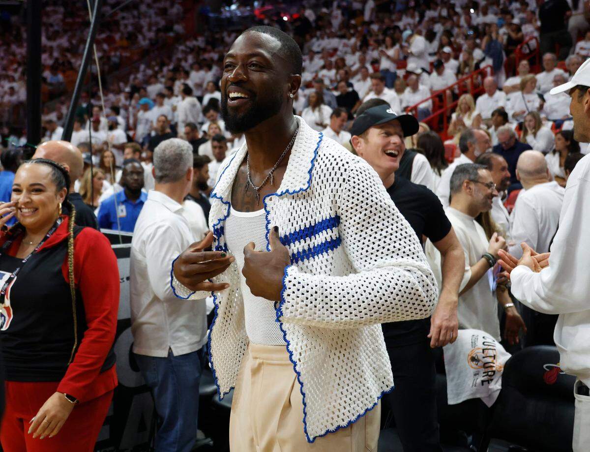 Former Miami Heat star Dwyane Wade shows his support before the start of Game 3 of the NBA Finals against the Denver Nuggets at the Kaseya Center on Wednesday, June 7, 2023, in Miami, Florida.