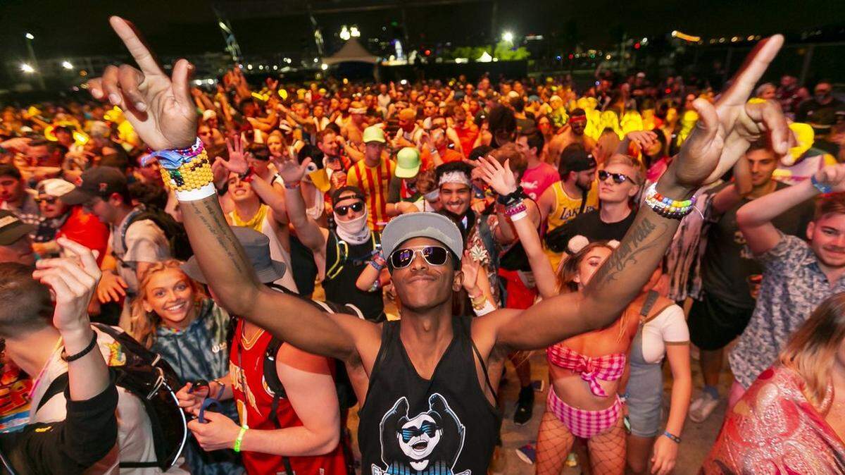 Miles Church, 26, from California, dances to the music during the 2019 Ultra Music Festival on Virginia Key in March.