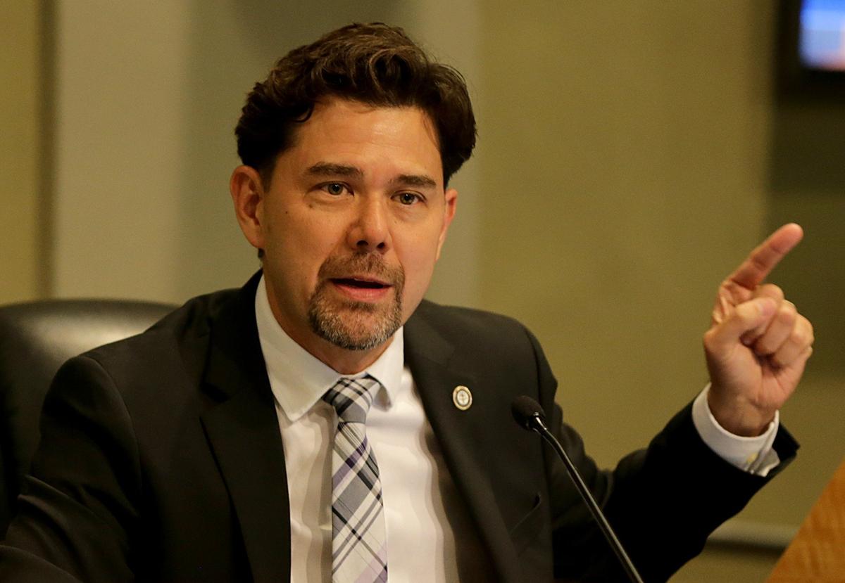 Miami Commissioner Ken Russell was the swing vote on the soccer stadium plan and called for a one-week delay in the vote so some issues could be worked out.