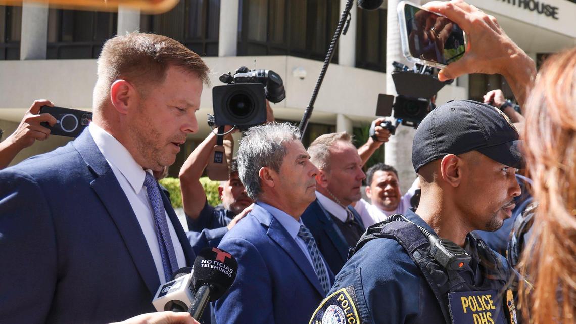 Carlos De Oliveira, a property manager at Donald Trump’s Mar-a-Lago estate, leaves federal court on Monday in Miami. He faces charges of scheming with the former president to hide security footage from investigators probing Trump’s hoarding of classified documents/ His formal arraignment was postponed until May 10 because he has not yet retained a South Florida attorney.