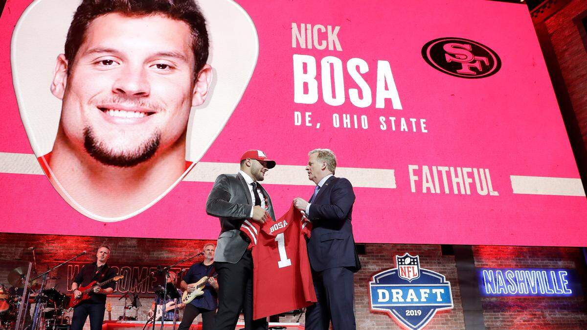 Ohio State defensive end Nick Bosa poses with NFL Commissioner Roger Goodell after the San Francisco 49ers selected Bosa in the first round at the NFL football draft, Thursday, April 25, 2019, in Nashville, Tenn.