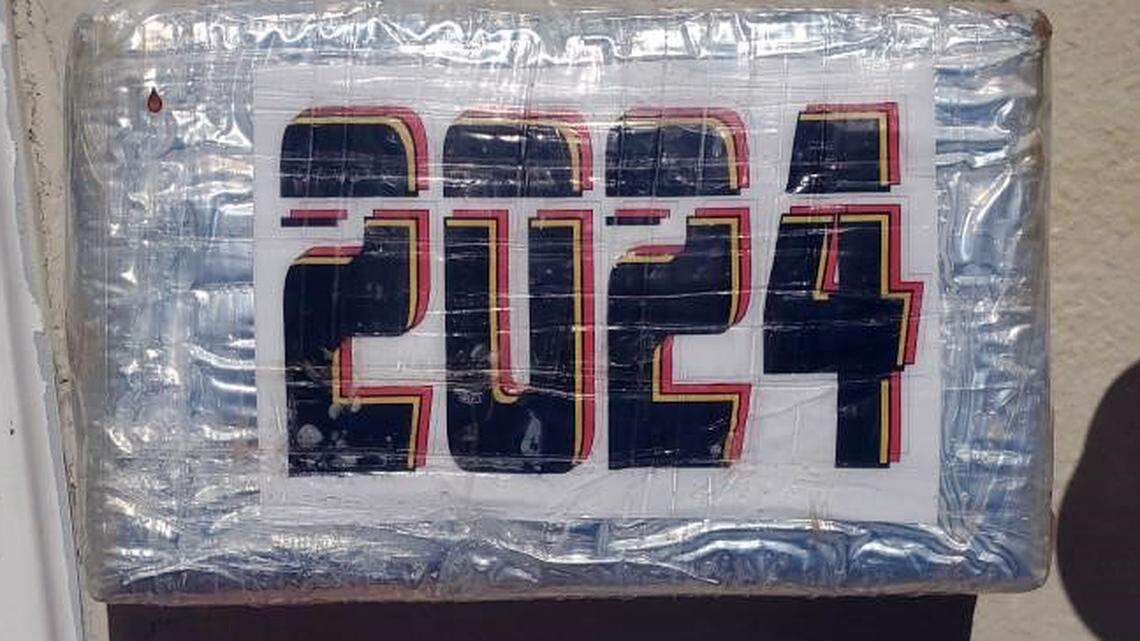 A brick of cocaine is displayed on a table. The drugs were found by snorkelers off Key Largo on Monday, May, 15, 2023, according to the Monroe County Sheriff’s Office.