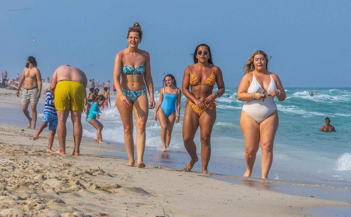 Beach goers enjoy the beautiful weather, during spring break in Miami Beach, on Saturday March 09, 2024.