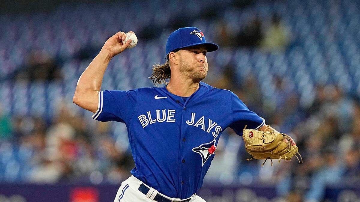 Jun 27, 2022; Toronto, Ontario, CAN; Toronto Blue Jays pitcher Shaun Anderson (64) pitches to the Boston Red Sox during the ninth inning at Rogers Centre. Mandatory Credit: John E. Sokolowski-USA TODAY Sports