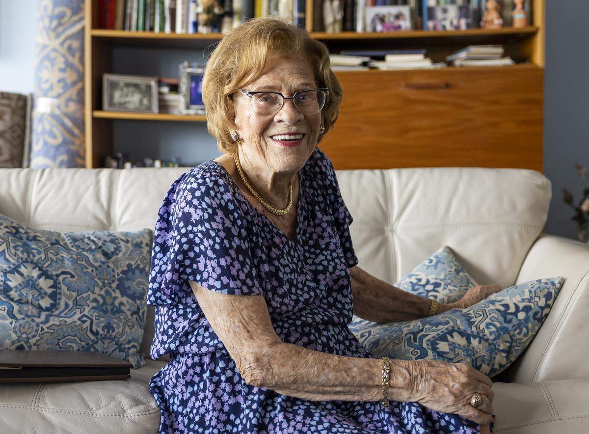 Ruth Di Stefano, a 97-year-old Holocaust survivor, at her home on Friday in Fort Lauderdale. Di Stefano received a free gift bag from Goodman Jewish Family Services containing a calendar, apples, candles, honey, and grape juice in anticipation of the Rosh Hashana holiday.