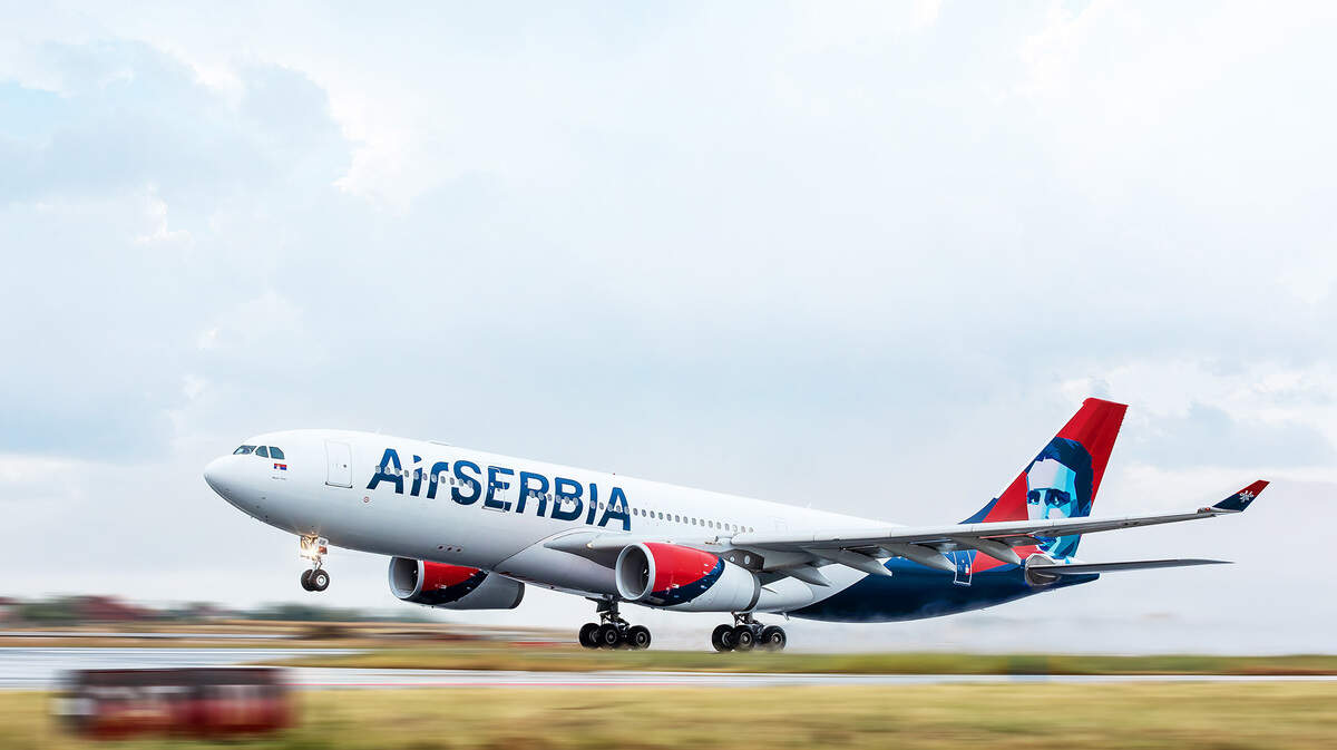 An Air Serbia flight taking off.