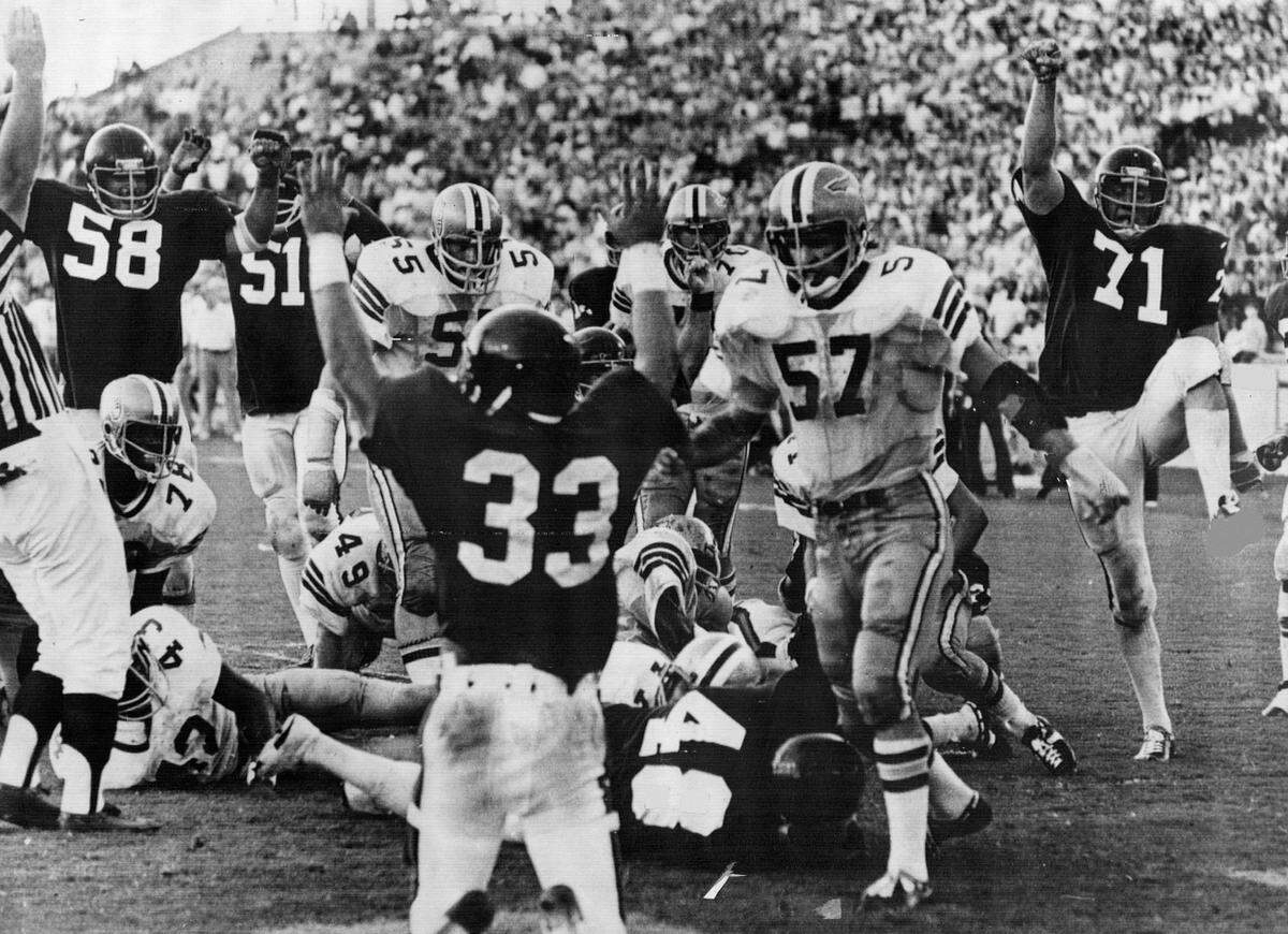 The Hurricanes score against he Seminoles in an early 1970s game.