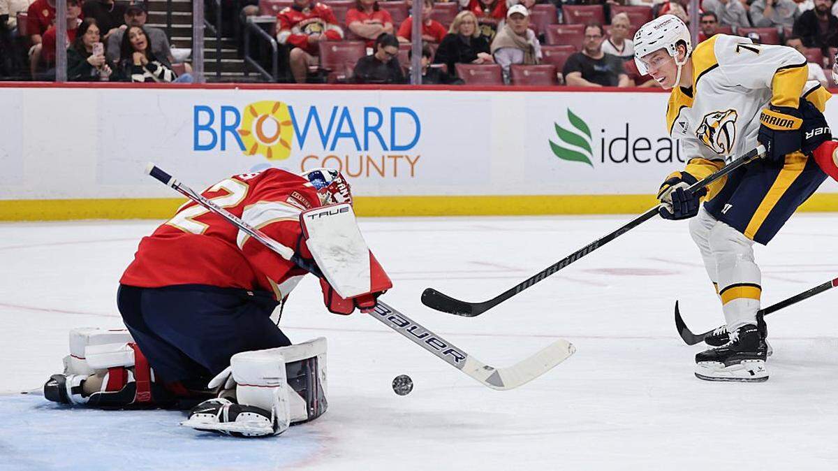 SUNRISE, FLORIDA - DECEMBER 04: Sergei Bobrovsky #72 of the Florida Panthers blocks a shot from Matthew Wood #71 of the Nashville Predators during the first period at Amerant Bank Arena on December 04, 2025 in Sunrise, Florida. (Photo by Carmen Mandato/Getty Images)