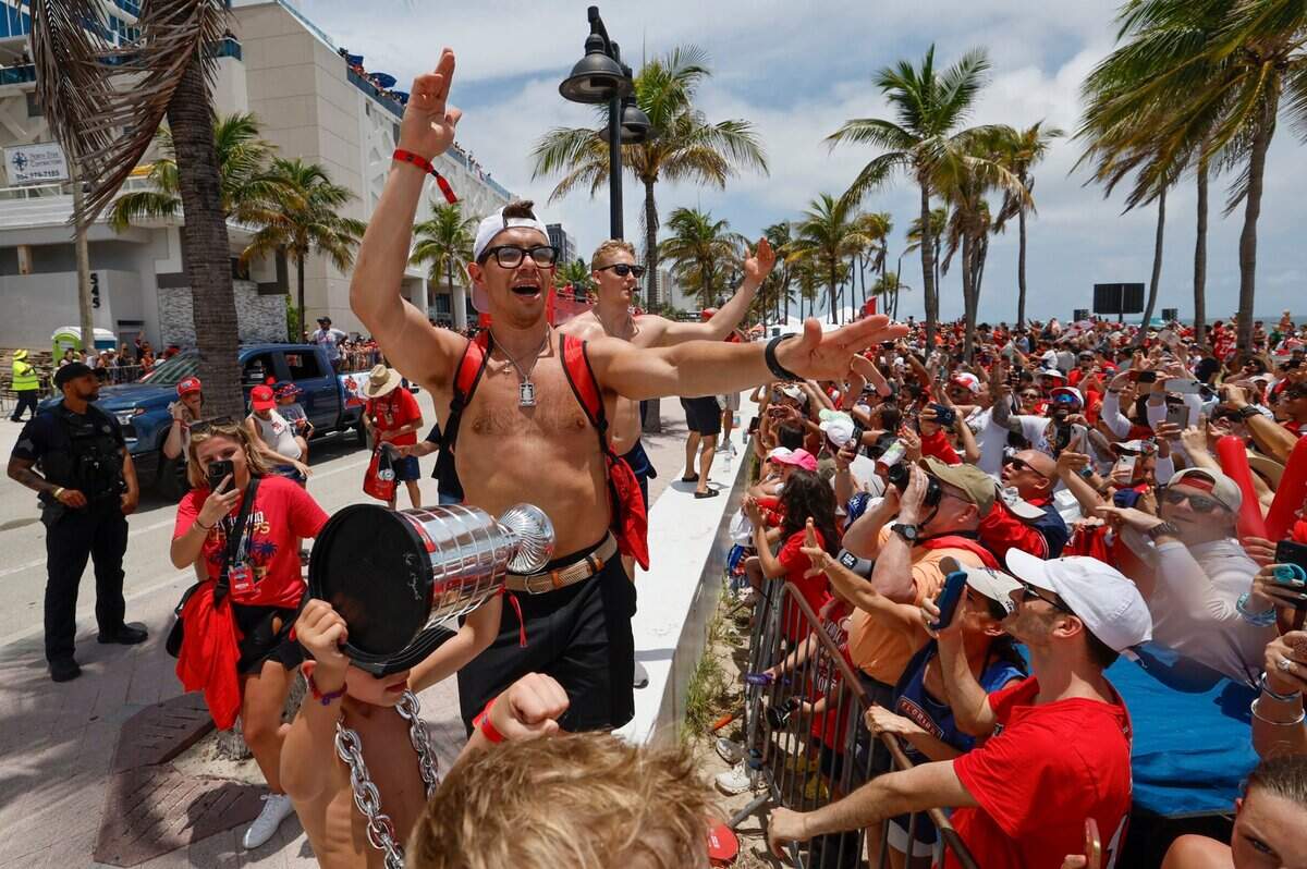 Florida Panthers center Evan Rodrigues and defenseman Gustav Forsling greets fans during the Florida Panthers Stanley Cup victory parade and rally at the beach along A1A in Fort. Lauderdale, Florida on Sunday, June 22, 2025.