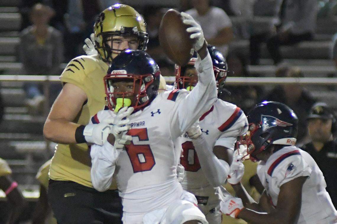 Miramar safety Kamar Lhomme celebrates after recovering a fumble in a game against Western on Thursday, Oct. 20, 2022.
