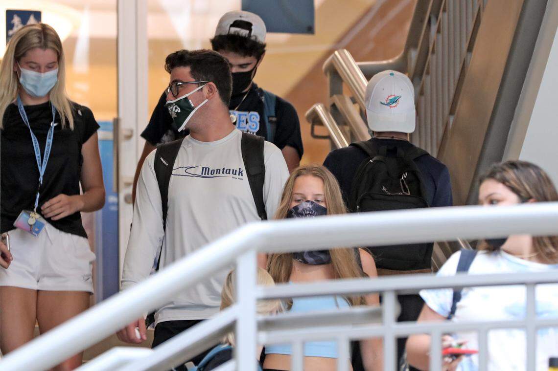 Students head downstairs in the Carl DeSantis Building at Nova Southeastern University’s Davie campus on Thursday, Aug. 20, 2020. (Amy Beth Bennett/South Florida Sun Sentinel/TNS)