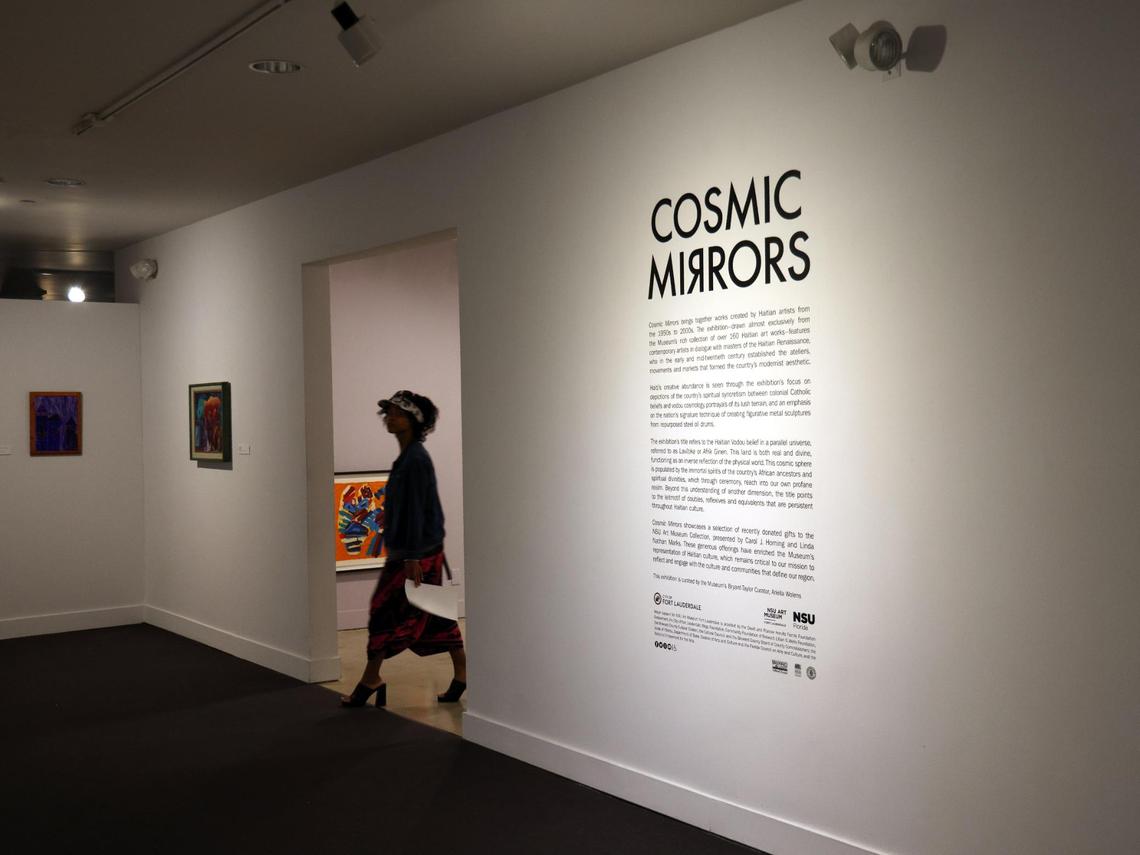 On Tuesday, June 6, 2023, art lover browses through the recently opened Haitian art show entitled “Cosmic Mirrors” at NSU Art Museum in Fort Lauderdale, Florida.