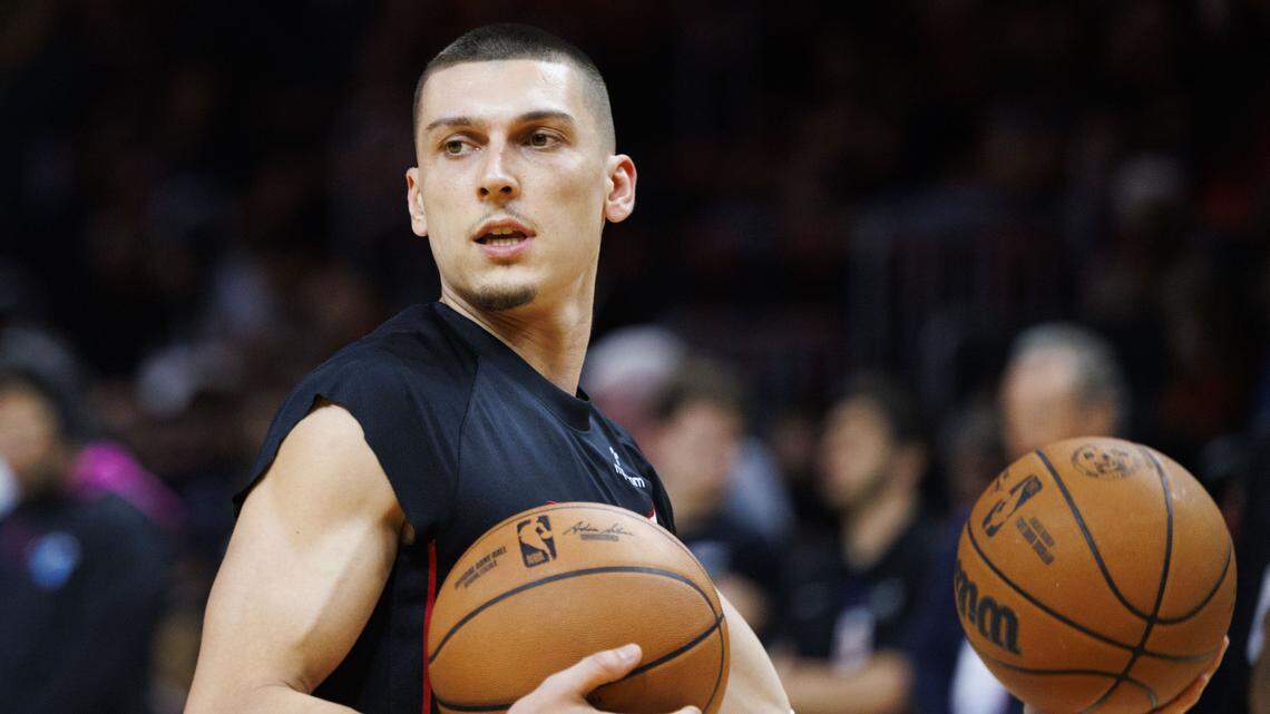 Miami Heat guard Tyler Herro (14) warms up before the first half of a game against the Dallas Mavericks on Nov. 24, 2025, at Kaseya Center in Miami.