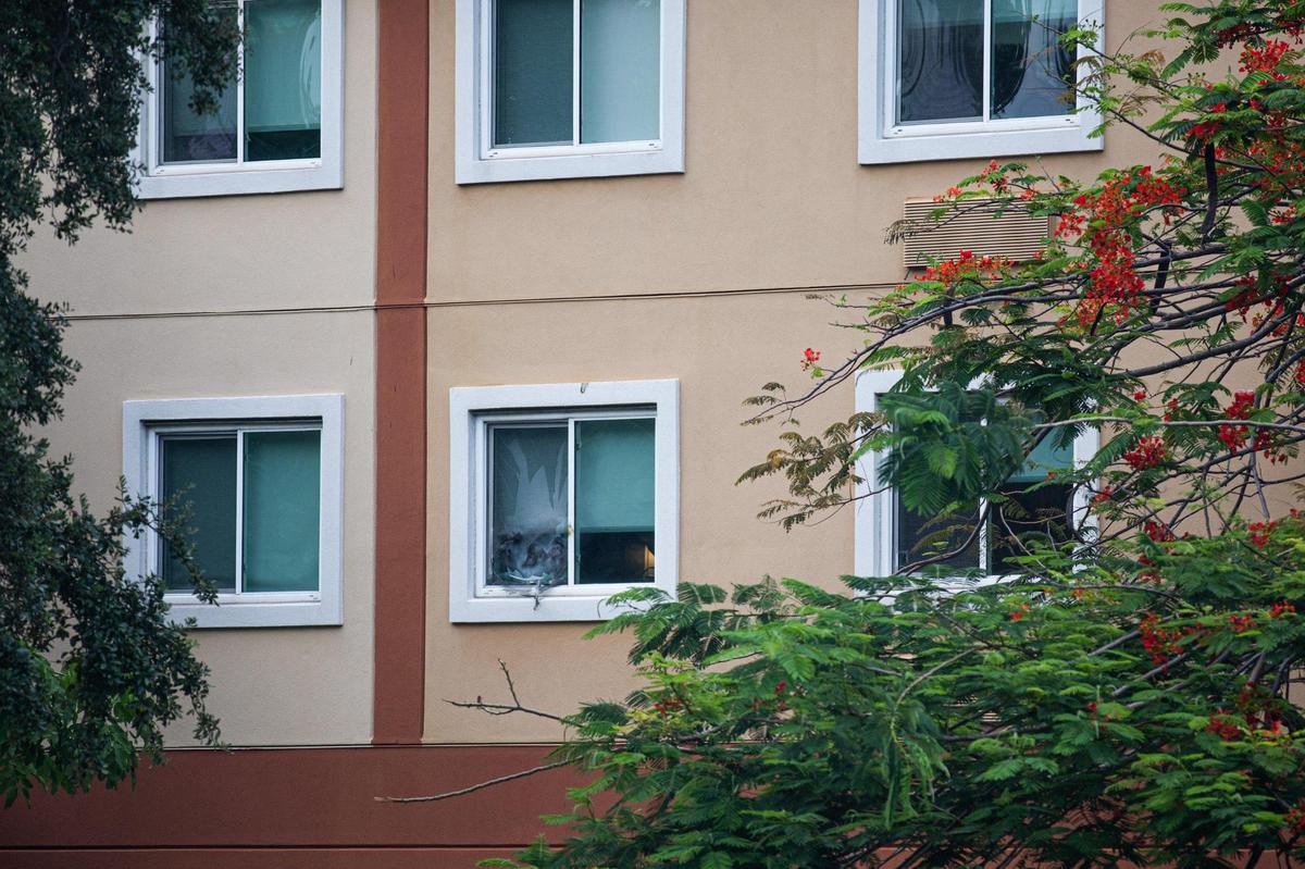 Miami-Dade Police killed a man in a Miami Springs hotel believed to have ties to the vehicle used in the shooting of one of their officers Monday night in Liberty City.