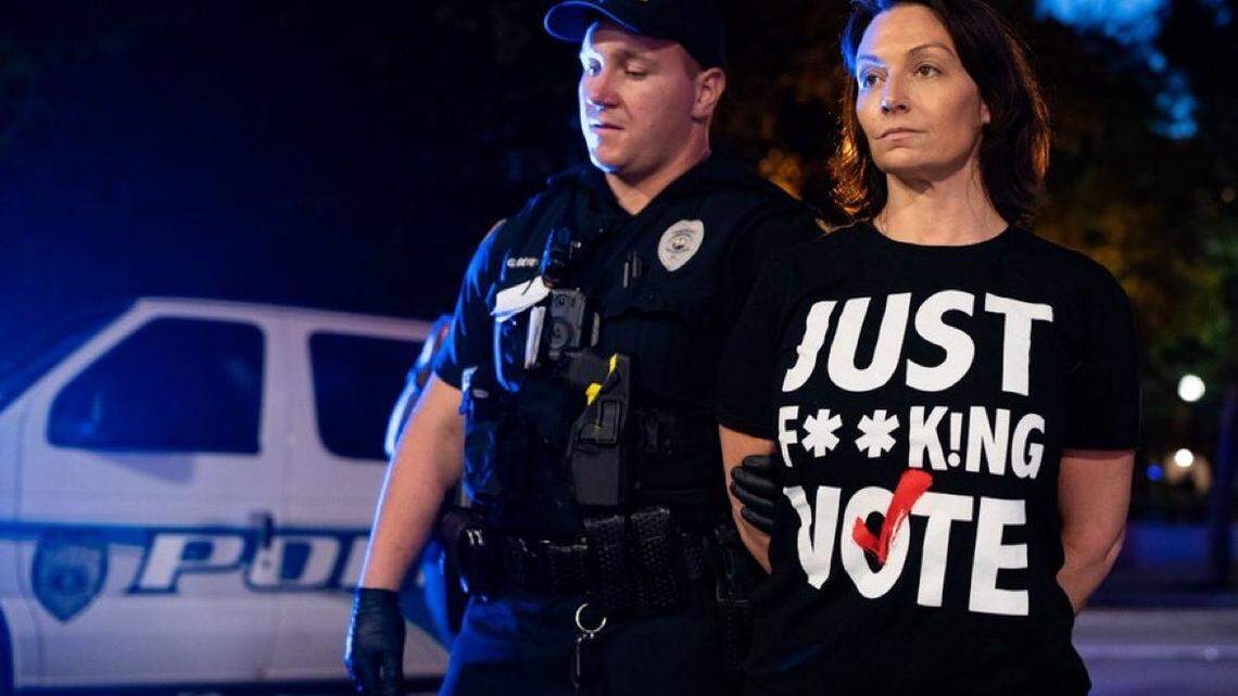 A photo of Florida Democrats Chair Nikki Fried being arrested Monday night.
