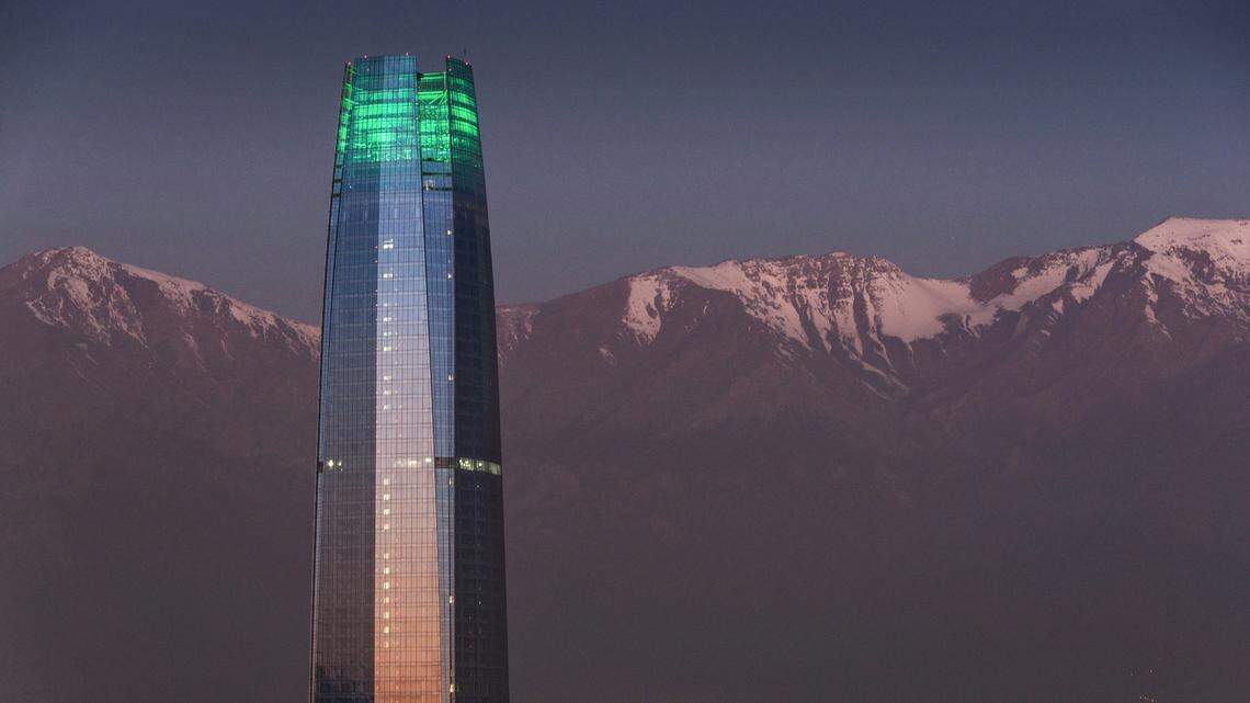 In Santiago, Chile, the Andes mountains tower over the metropolitan city, and birds fly overhead on their journey from the sea.