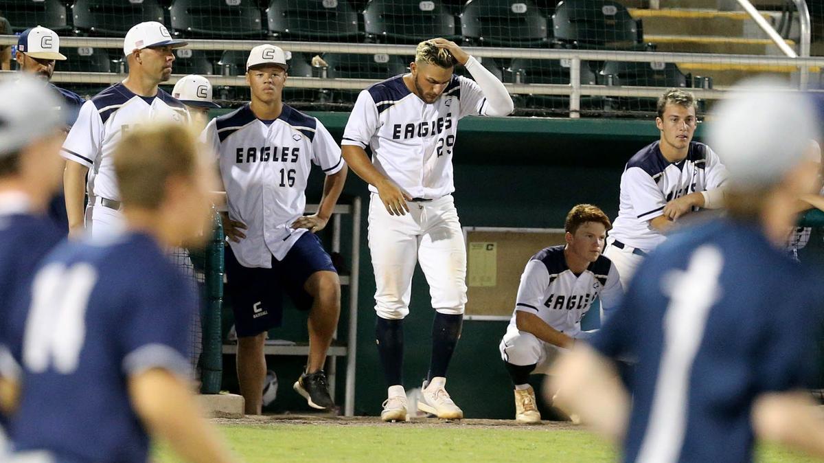 Fort Lauderdale Calvary Christian Academy Mykanthony Valdez (29) walks out of the dugout as Clearwater Calvary Christian Academy begins to celebrate as they win the FHSAA Baseball Class 4A Semi-Finals at CenturyLink Sports Complex - Hammond Stadium in Fort Myers, Florida, Friday, May, 24, 2019.