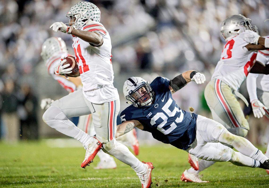 Penn State linebacker Von Walker stops Ohio State’s Parris Campbell as he tries to return a kick off during the Saturday, October 22, 2016 game at Beaver Stadium. Penn State won, 24-21.