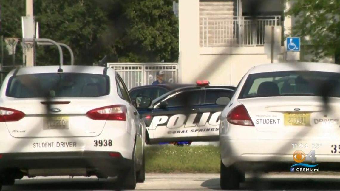The scene outside Coral Springs High School in this screen grab from CBS4 Miami. Two students got into a dispute over a girl, police said, and one of the boys was stabbed.