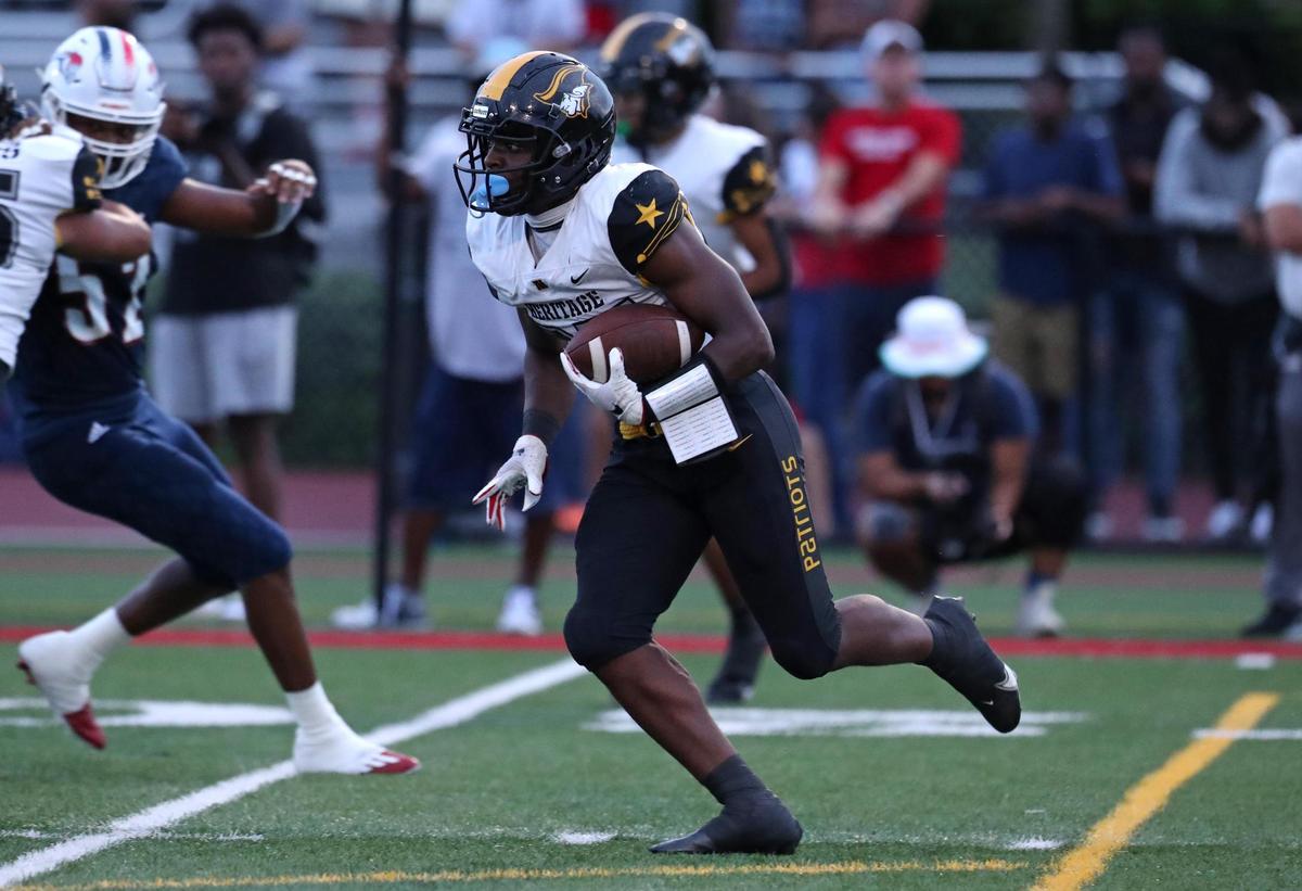 American Heritage running back Byron Louis rushes against Chaminade-Madonna during the first half on Friday, Sept. 16, 2022 in Hollywood.