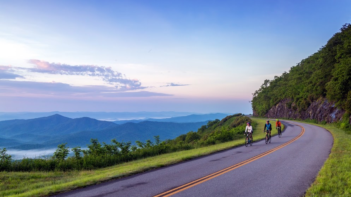 Cyclists enjoy the Blue Ridge Parkway near Asheville, N.C., a favorite vacation destination for South Floridians.