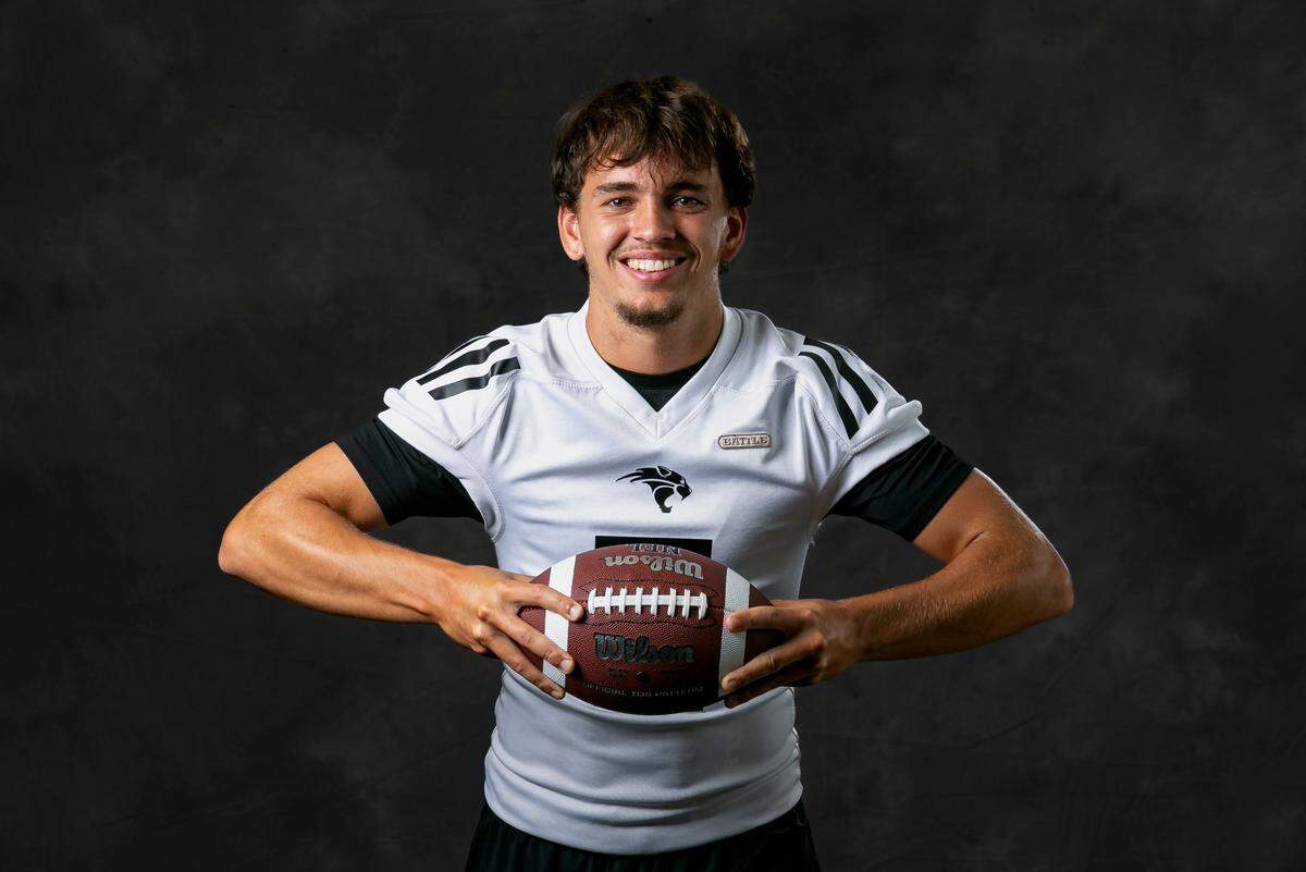 Collin Hurst, a quarterback from Western High School, is photographed during High School Media Day at Pompano Beach High School on Tuesday, Aug. 2, 2022, in Pompano Beach, Fla.