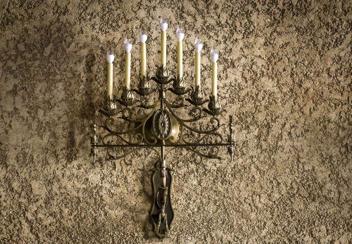 A wall sconces Courtroom 6-1, is one of the historic elements repaired as part of restoration of the old courthouse in Miami, Florida, on Wednesday, January 14, 2026. The Dade County Courthouse is significant as an excellent example of Neo-Classical architecture. The detailing of the remaining historic interior spaces and features continue to reflect this distinctive style and contributes to a more complete understanding of the historic character of the Courthouse.