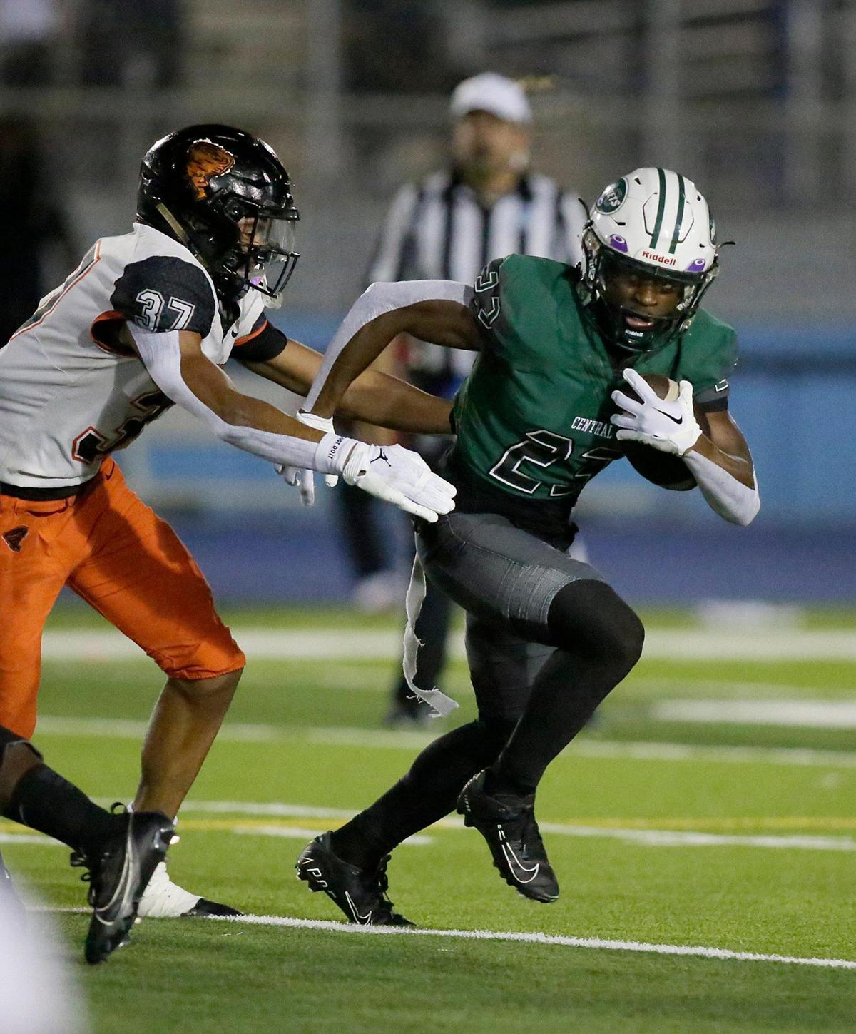 Miami Central Rockets running back King Davis (23) carries the ball against Booker T Tornadoes during the regional semifinal football game on Friday, November 17, 2023 at Traz Powell Stadium in Miami. Andrew Uloza / for Miami Herald
