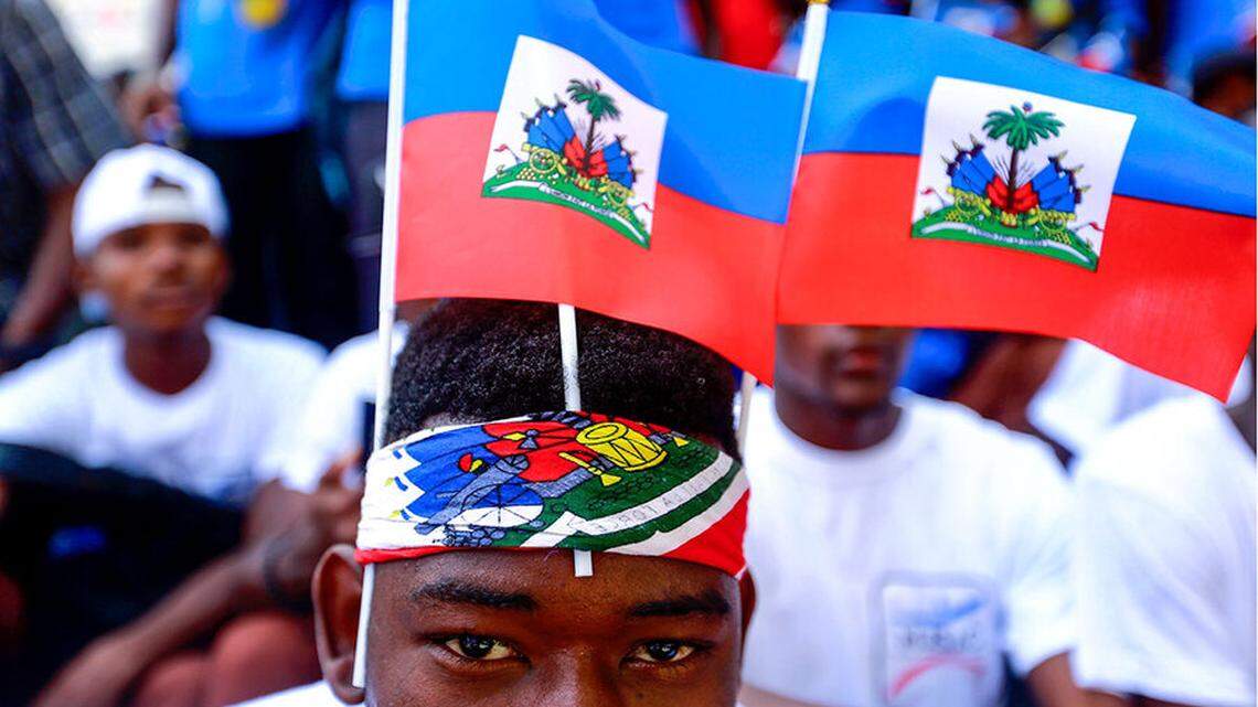 Haitian students in Port-au-Prince celebrate the 216th anniversary of their national flag in 2019.