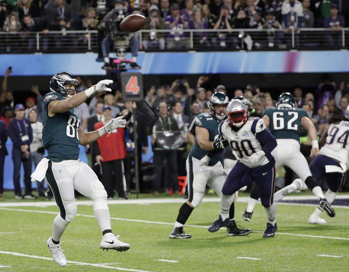 FILE - In this Feb. 4, 2018, file photo, Philadelphia Eagles’ Trey Burton, left, throws a touchdown pass to Nick Foles during the first half of the NFL Super Bowl 52 football game against the New England Patriots, in Minneapolis. The “Philly Special” _ on a fourth down late in the first half of Super Bowl 52 will be remembered as one of the gutsiest calls in sports history. (AP Photo/Mark Humphrey, File)