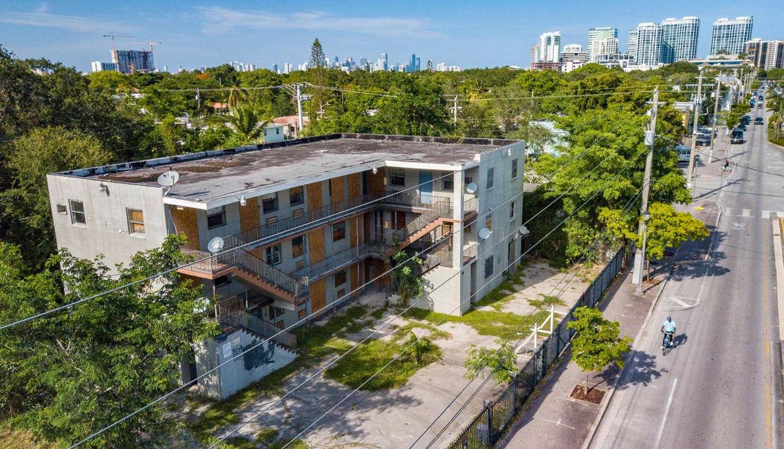 A vacated, condemned apartment building is one of the last standing along Grand Avenue in Miami’s historically Black West Coconut Grove on Thursday, June 16, 2022. The West Grove community is disappearing amid rapid gentrification.