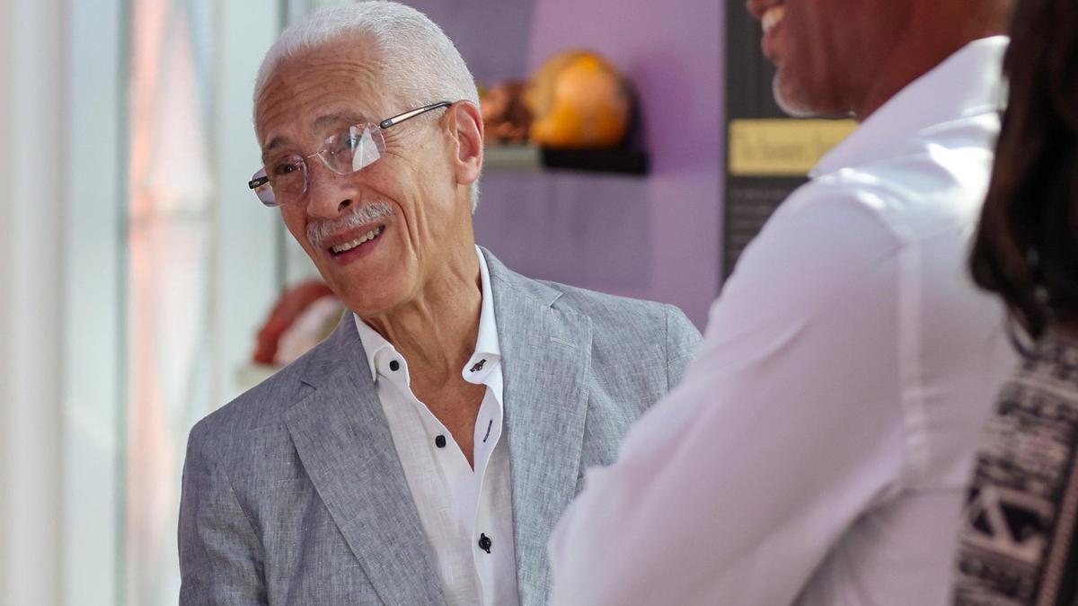 Sunrise Airways President Philippe Bayard, left, talks with attendees prior to Sunrise Airways press conference on October 4, 2023 at the Little Haiti Cultural Center Complex in Miami to announce the company’s new connection from Miami to Cap-Haïtien and Port-au-Prince.