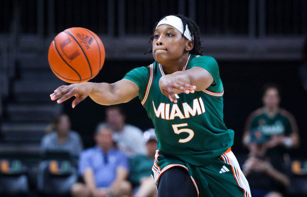 Miami Hurricanes Ahnay Adams(5) passes the ball during the first quarter of the game on Sunday, Dec. 1, 2024, at Watsco Center in Coral Gables, Fla.