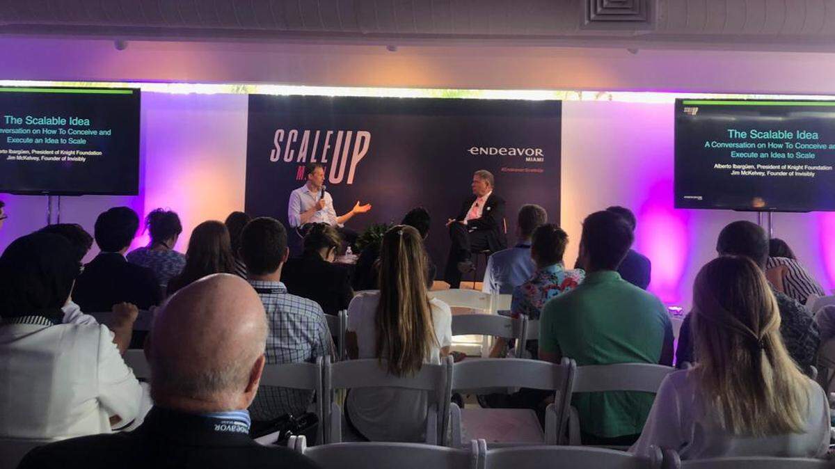 Alberto Ibarguen, right, talks with Jim McKelvey, co-founder of Square, at the Endeavor Miami ScaleUp conference Sept. 21 in Wynwood.