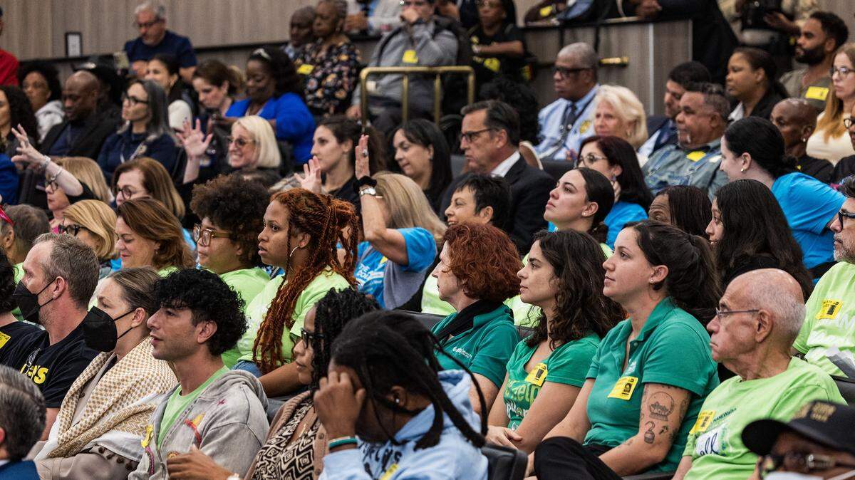 Residents and attendees react as Miami-Dade County Mayor Daniella Levine Cava presents her $12.9 billion spending proposal, during the final budget meeting at the County Commission Chambers, on Thursday September 18, 2025.