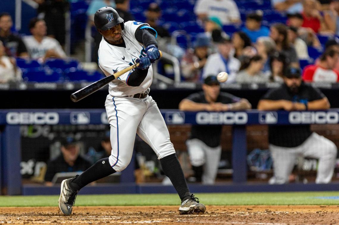 Miami Marlins batter Xavier Edwards (63) singles on a ground ball to center field during the seventh inning of a MLB game against the Atlanta Braves at loanDepot Park, in Miami, Florida, on Wednesday, May 3, 2023.
