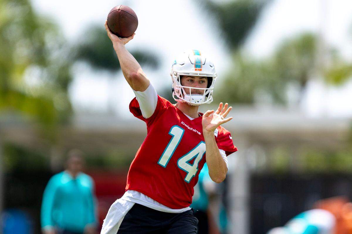 Miami Dolphins quarterback Mike White (14) throws the ball during 2023 Miami Dolphins Mandatory Minicamp at Baptist Health Training Complex in Miami Gardens, Florida, on Thursday, June 8, 2023.