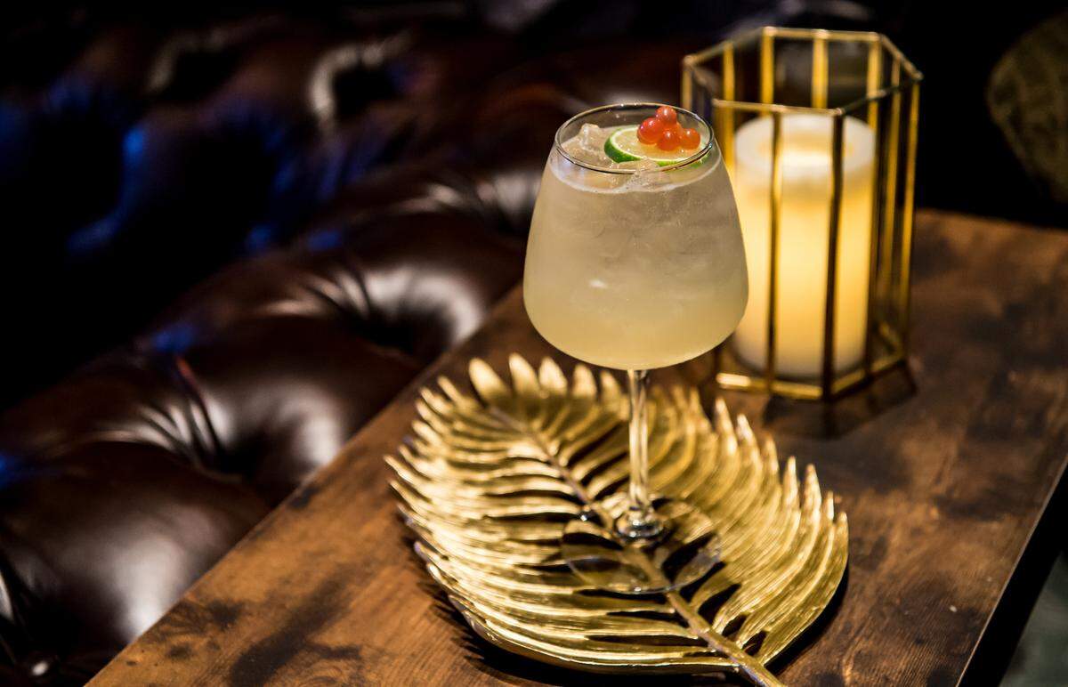 Mickey Burkes serves craft cocktails with Danilo Bozovic of Swizzle Rum Bar + Drinkery curating the menu.