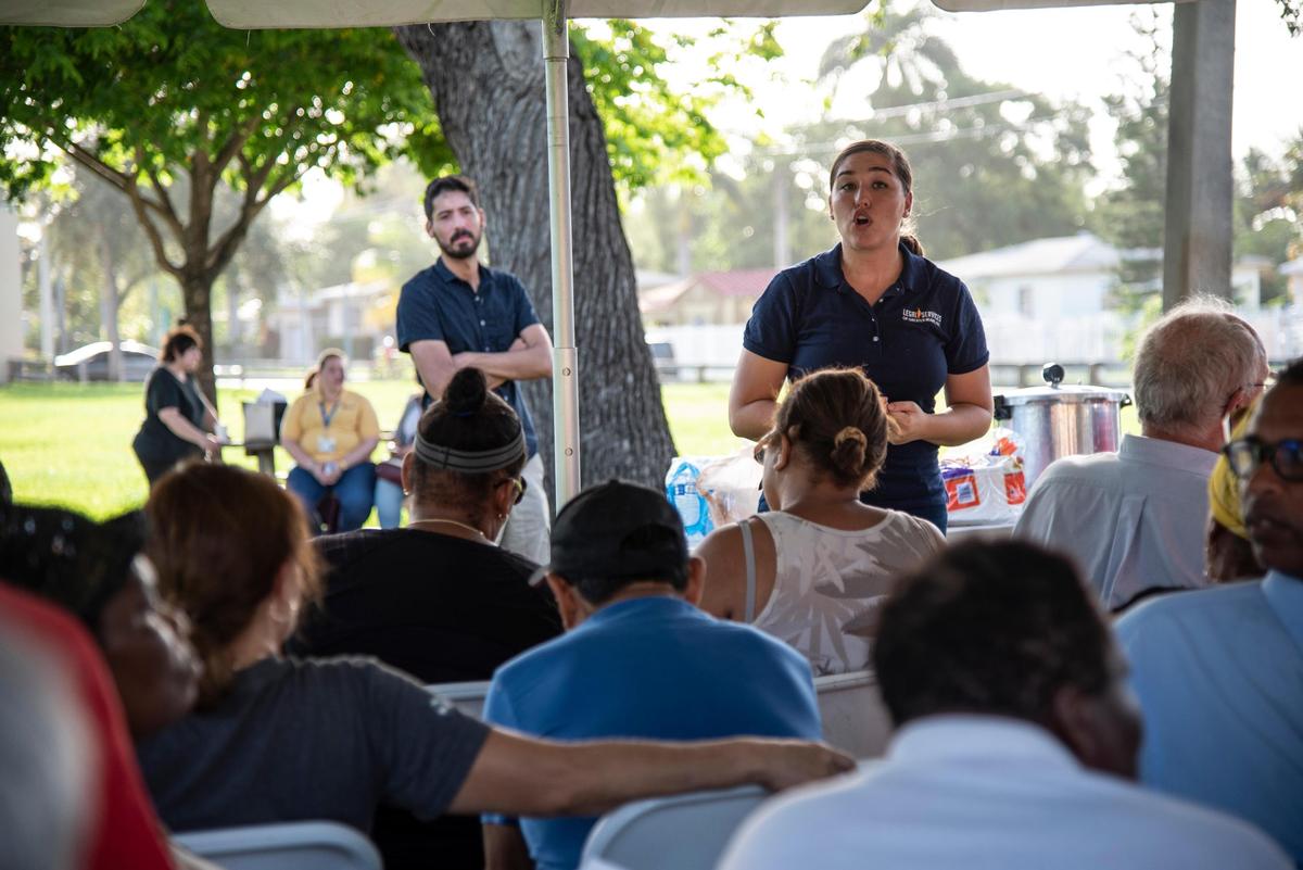 Nejla Calvo, a lawyer for Legal Services of Greater Miami explains homeowner rights to the residents of Miami Soar mobile home park on June 20, 2019. Calvo is representing the Homeowner’s Associations of Sunnyland and Trinidad Court in a case contesting the rent raised by the new landlord of Miami Soar.
