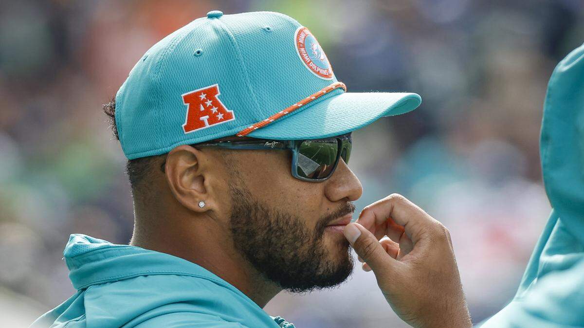 Miami Dolphins quarterback Tua Tagovailoa (1) on the sidelines in the first half during an NFL game against the Seattle Seahawks at Lumen Field in Seattle, Washington on Sunday, September 22, 2024.
