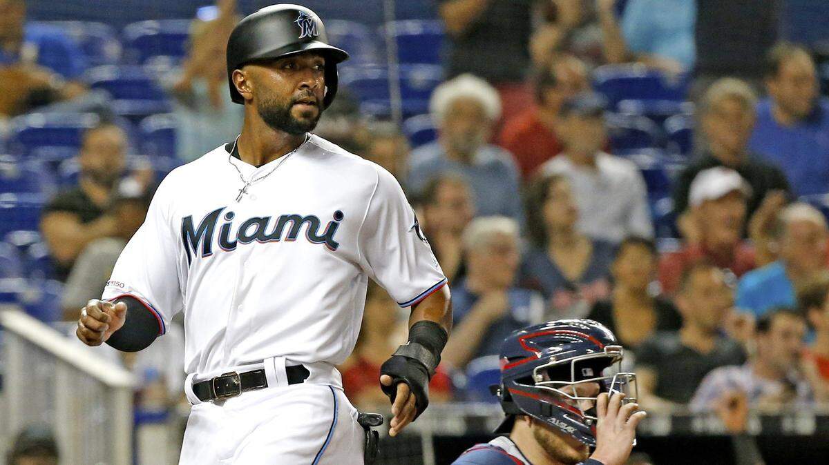 Miami Marlins right fielder Isaac Galloway (79) scores on a single by third baseman Martin Prado (14) in the second inning as the Miami Marlins host the Cleveland Indians at Marlins Park on Tuesday, April 30, 2019.