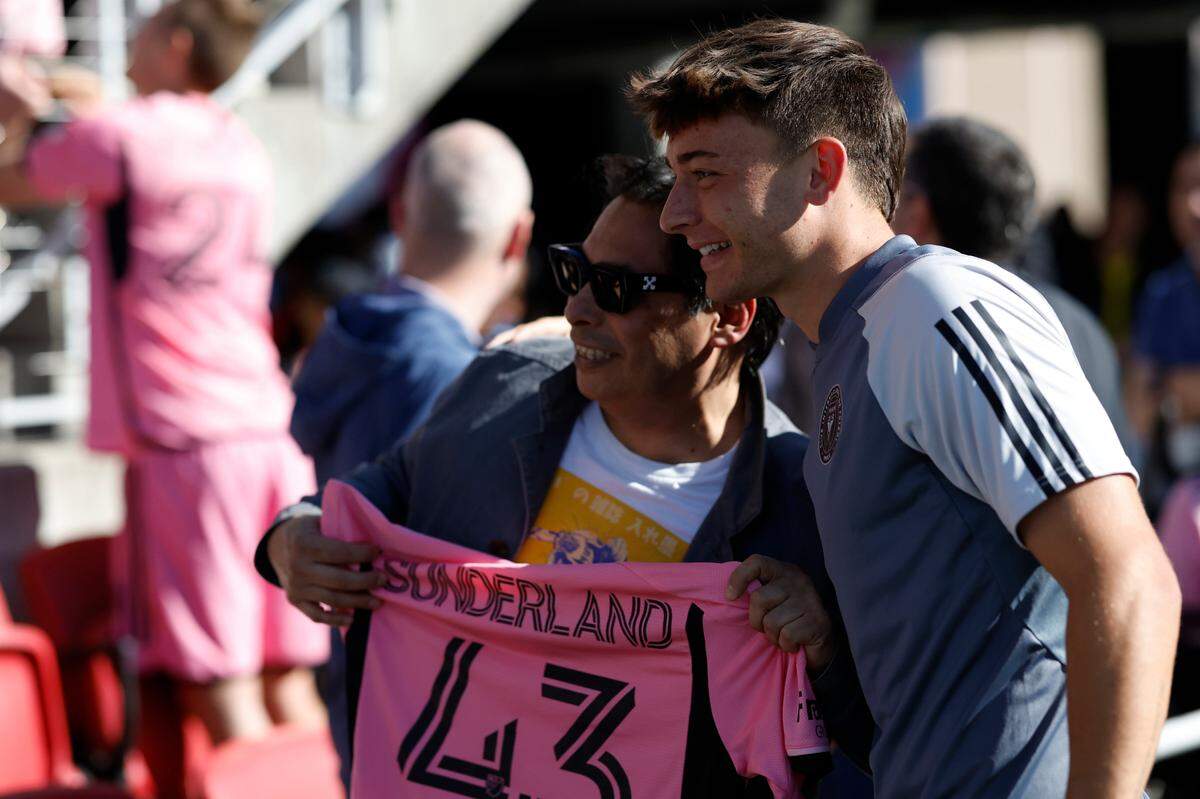 Mar 16, 2024; Washington, District of Columbia, USA; Inter Miami CF midfielder Lawson Sunderland (43) poses for a picture with a fan after the game against D.C. United at Audi Field. Mandatory Credit: Geoff Burke-USA TODAY Sports