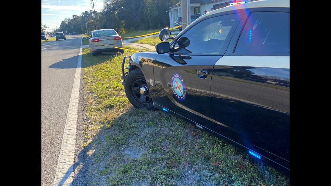 A Florida driver is accused of being under the influence and hitting two school crossing guards before driving away, troopers said.