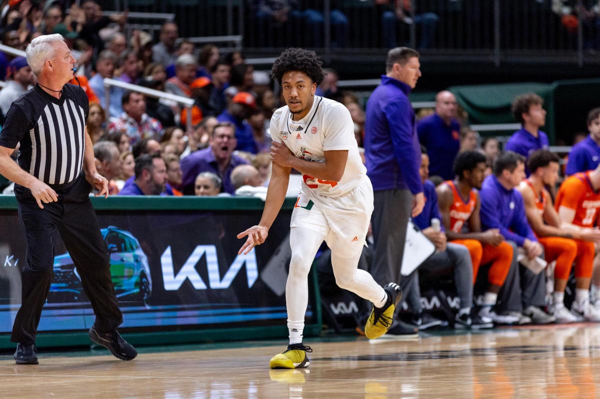 Miami Hurricanes guard Nijel Pack (24) reacts to hitting a three-pointer during the first half of an NCAA basketball game against Clemson at the Watsco Center in Coral Gables, Florida, on Wednesday, January 3, 2024.