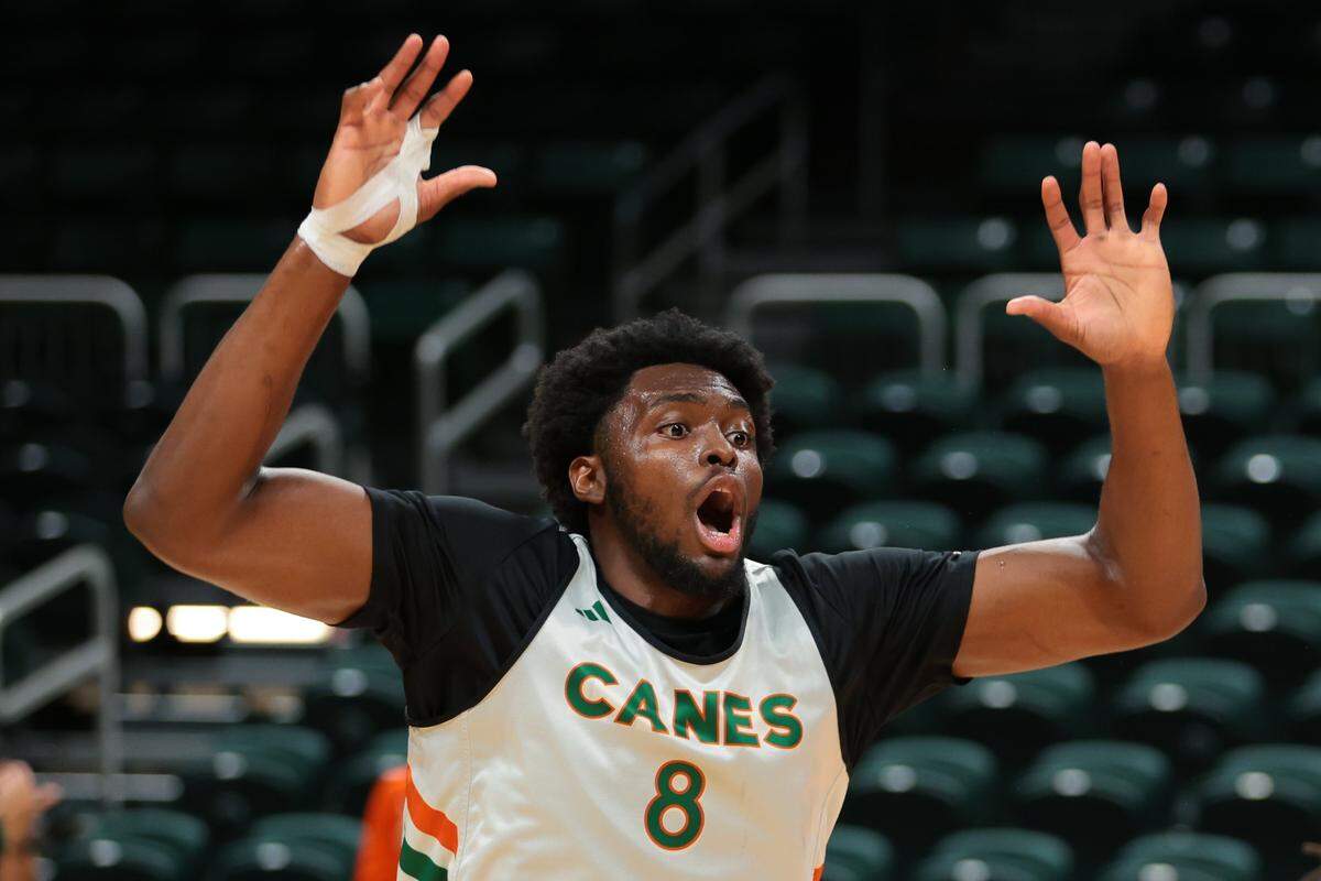 Miami Hurricanes center Ernest Udeh Jr. (8) plays defense during practice at the Watsco Center in Coral Gables, Florida, Tuesday, October 28, 2025. 