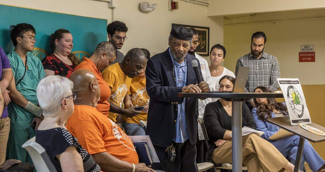 Imam Nasir Ahmad speaks during a prayer vigil at Al-Ansar where community members, faith leaders, and advocates urged Miami-Dade County officials to rescind budget cuts to an eviction diversion program aimed at protecting families from eviction and homelessness.
