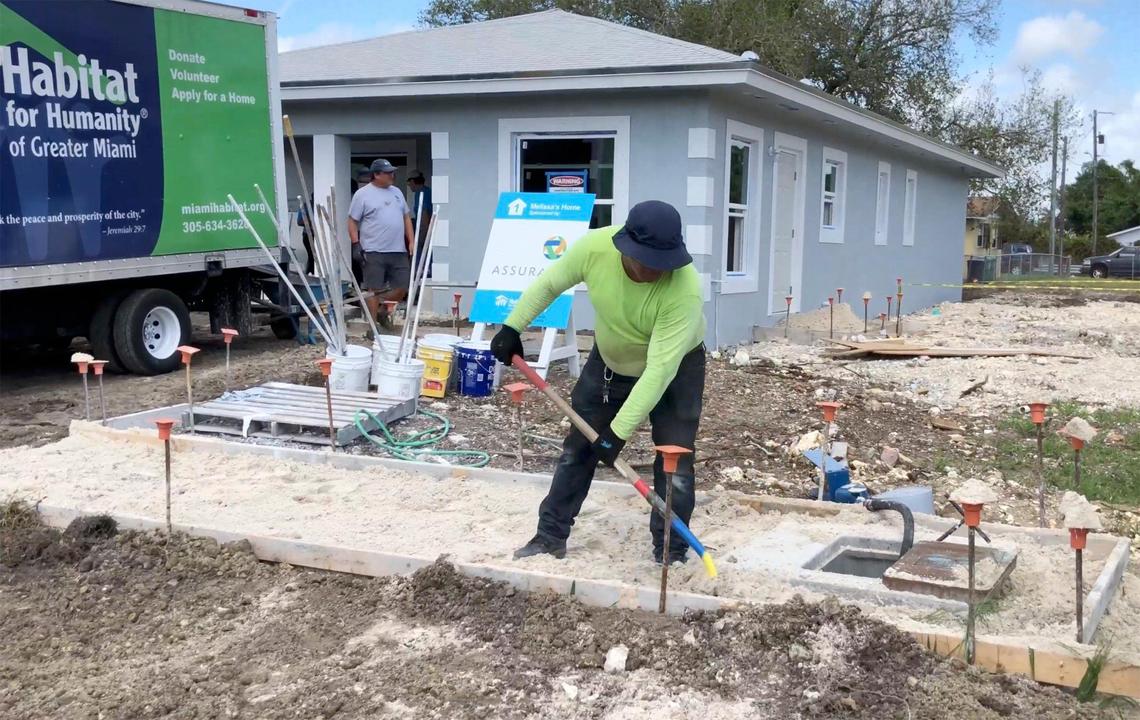 A squad of volunteers and soon-to-be homeowners works to finish eight Habitat for Humanity of Greater Miami houses in the South Miami-Dade neighborhood of Goulds as part of the nonprofit’s annual Blitz Build. The nonprofit just marked its 30th year of operation in Miami.