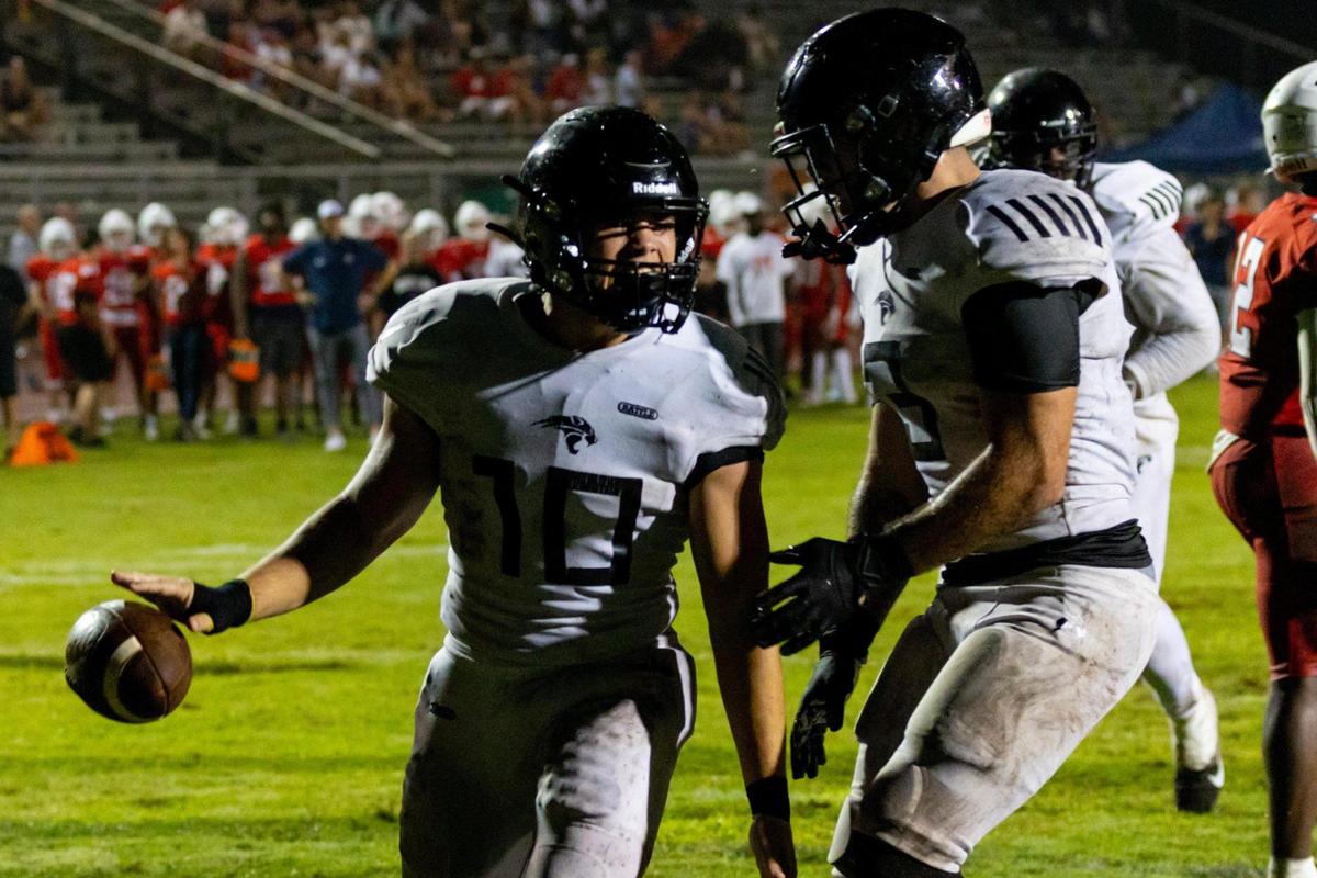 Western running back Brendan Leal (10) reacts with a teammate after scoring a touchdown during the 2023 Broward County National Football Showcase against Milton High at Western High School in Davie, Florida, on Thursday, August 24, 2023.