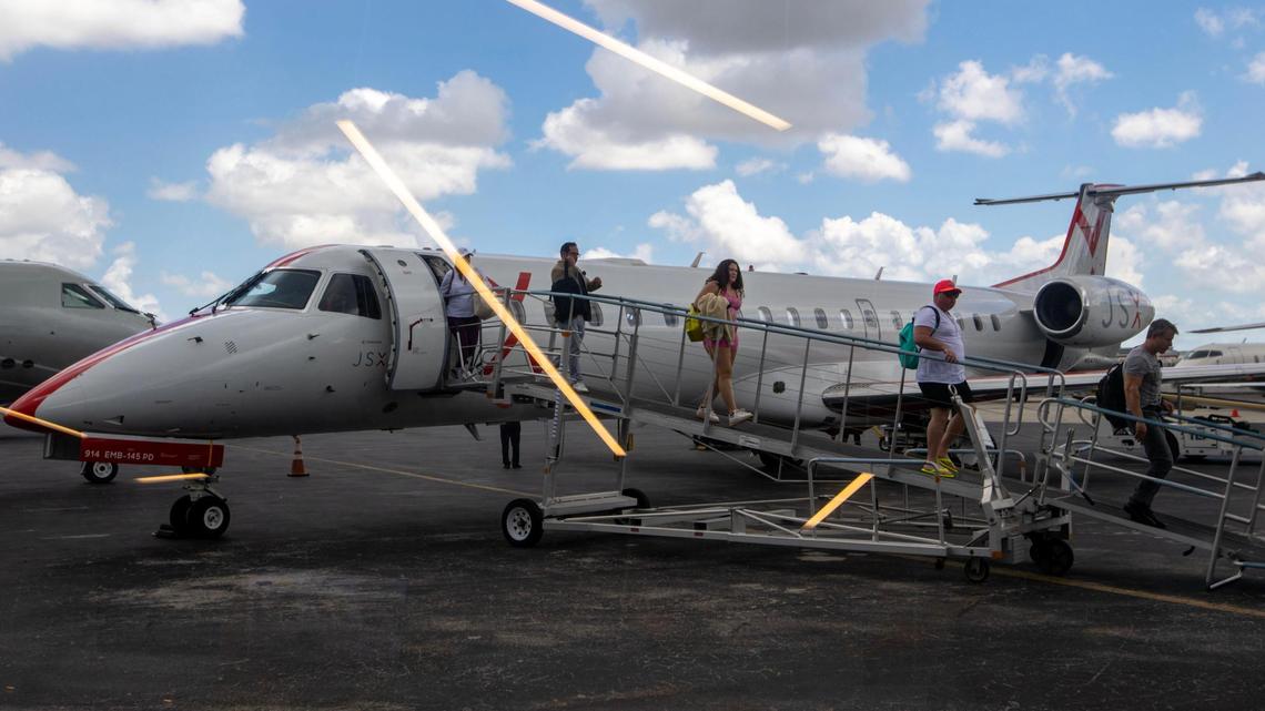Private flyers deplane their flight at JSX Terminal in Miami, Florida, on Friday, April 21, 2023.