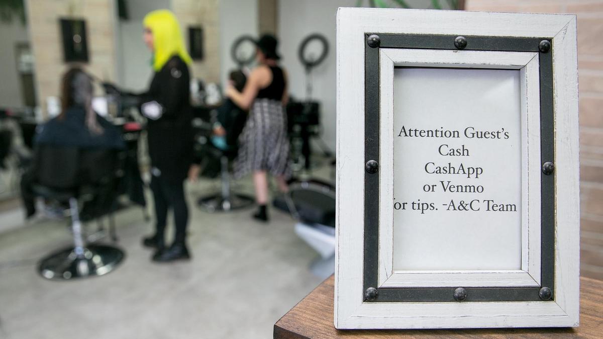 Art & Chemistry Beauty Lab uses Venmo or Cash App for customers to tip for hair salon services.